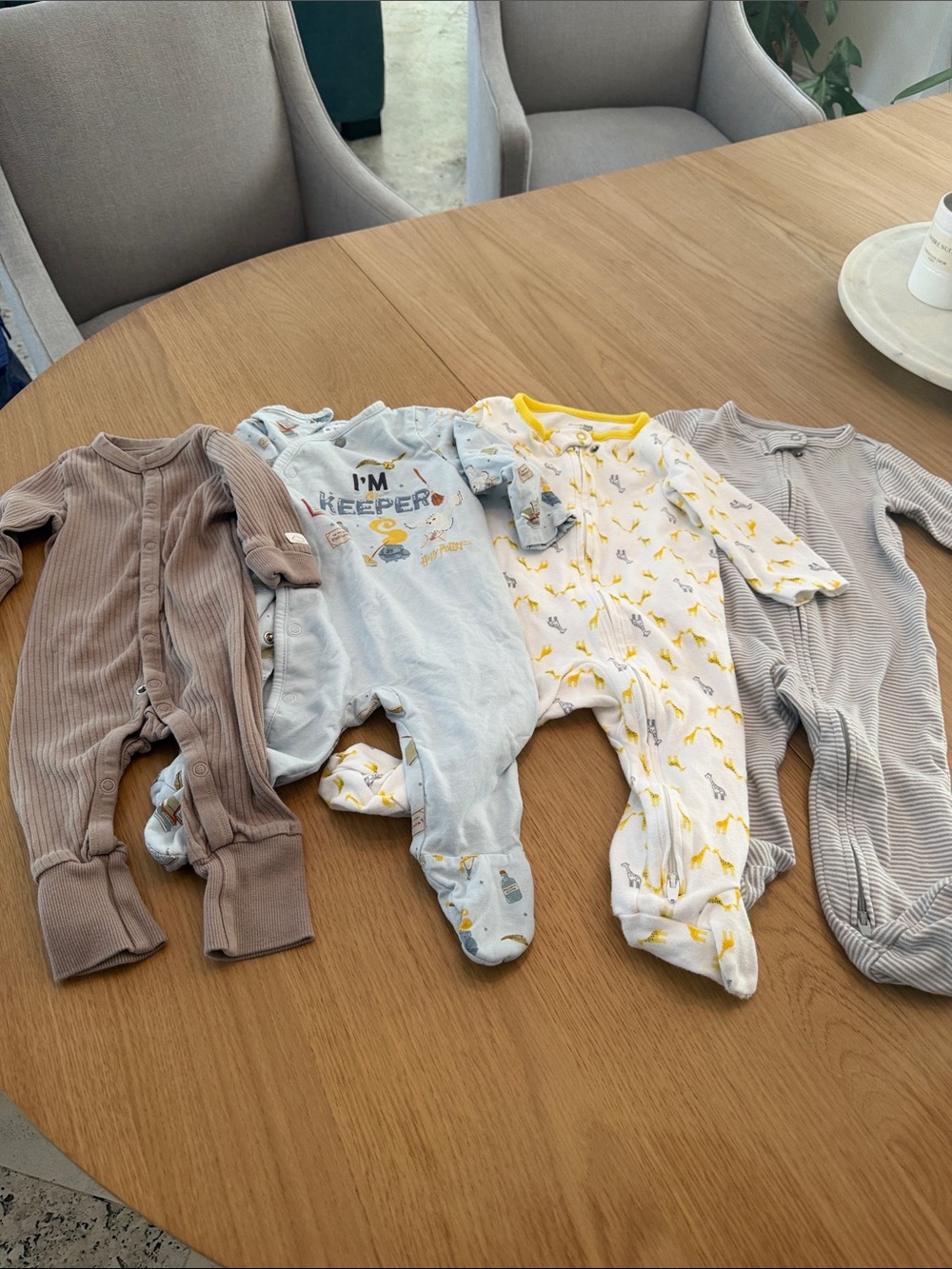 4 footies (1 3-6 month/ 1 3 month/ 2 6-9 month)